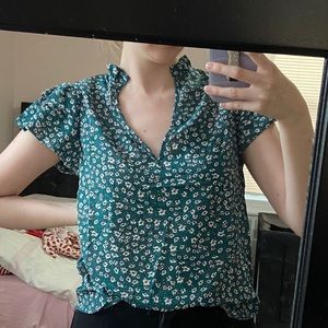 Green blouse with flowers